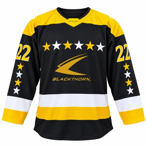 Custom black and gold ice hockey jersey with stars and Blackthorn crest — front