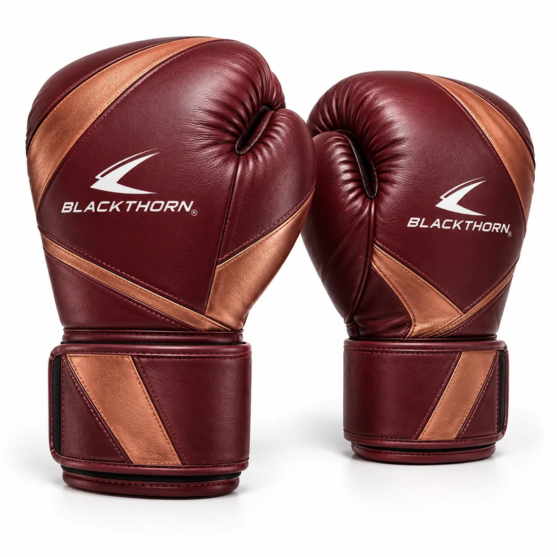 Pair of deep burgundy boxing gloves with copper diagonal stripes on the hand and cuff
