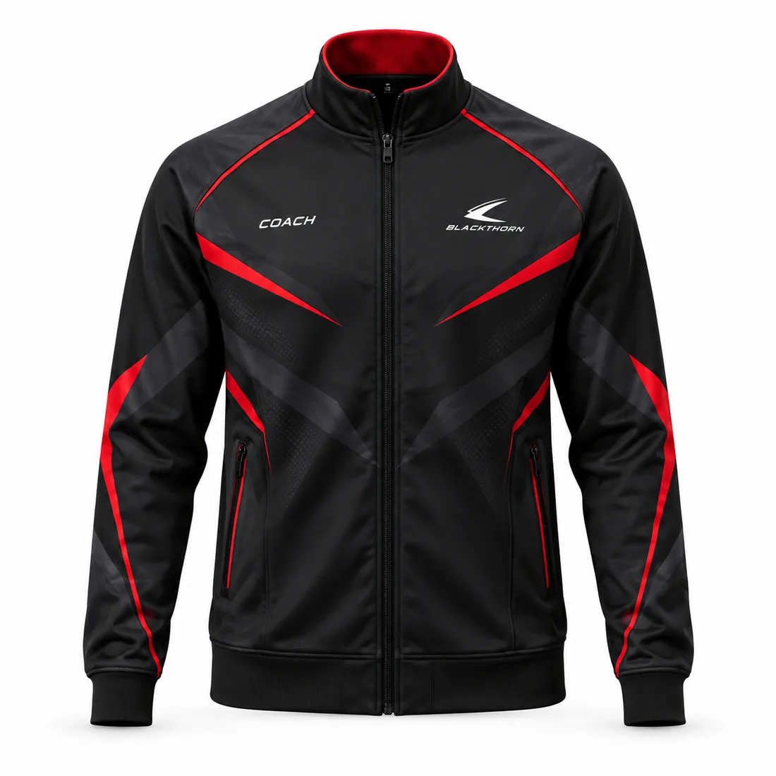 Black softshell coach jacket with red and charcoal shard graphics and COACH chest print, front view