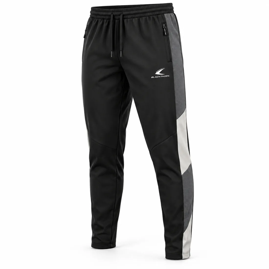 Black tapered training pants with grey and off-white colour-block panels and zip pockets, front view