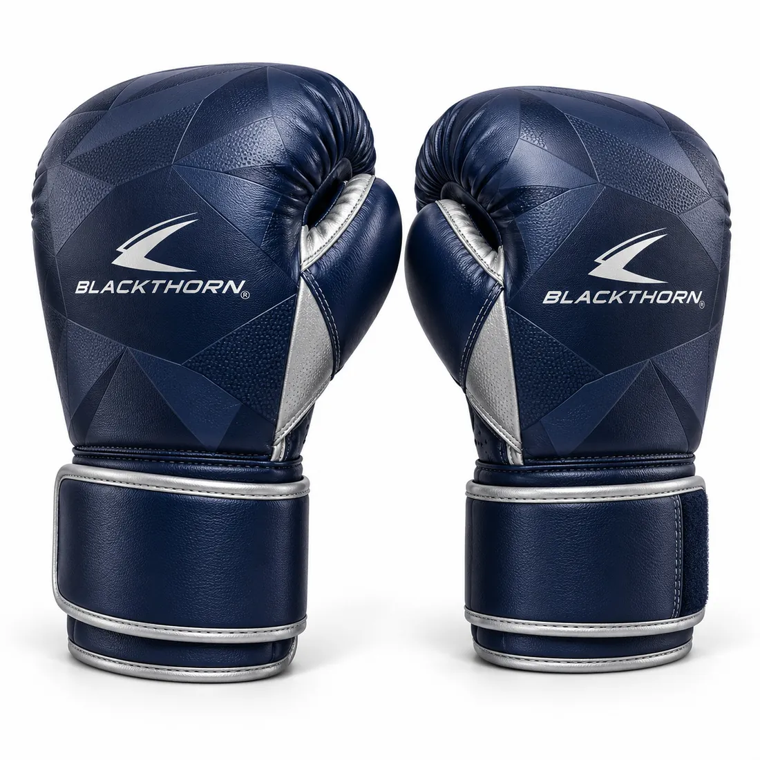 Pair of midnight navy sparring gloves with faceted texture, silver thumb panel and cuff bands