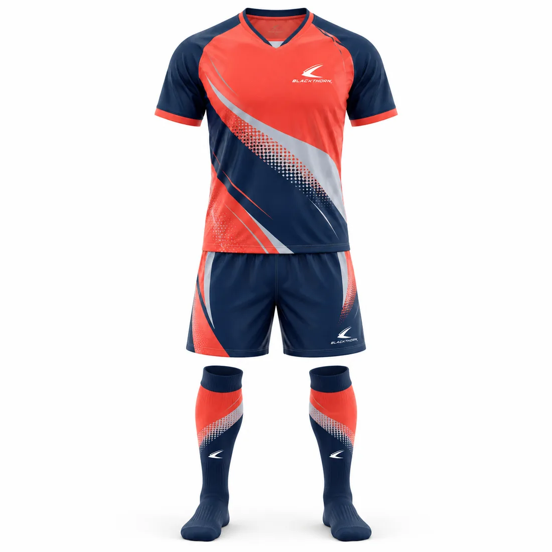 Coral Motion Soccer Kit front view, coral and navy jersey, navy shorts and socks, youth soccer kit supplier