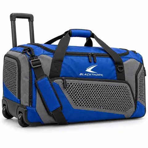 Fight Camp Cobalt Wheeled Duffel in cobalt blue and grey with telescopic handle, wheeled fight gear duffel