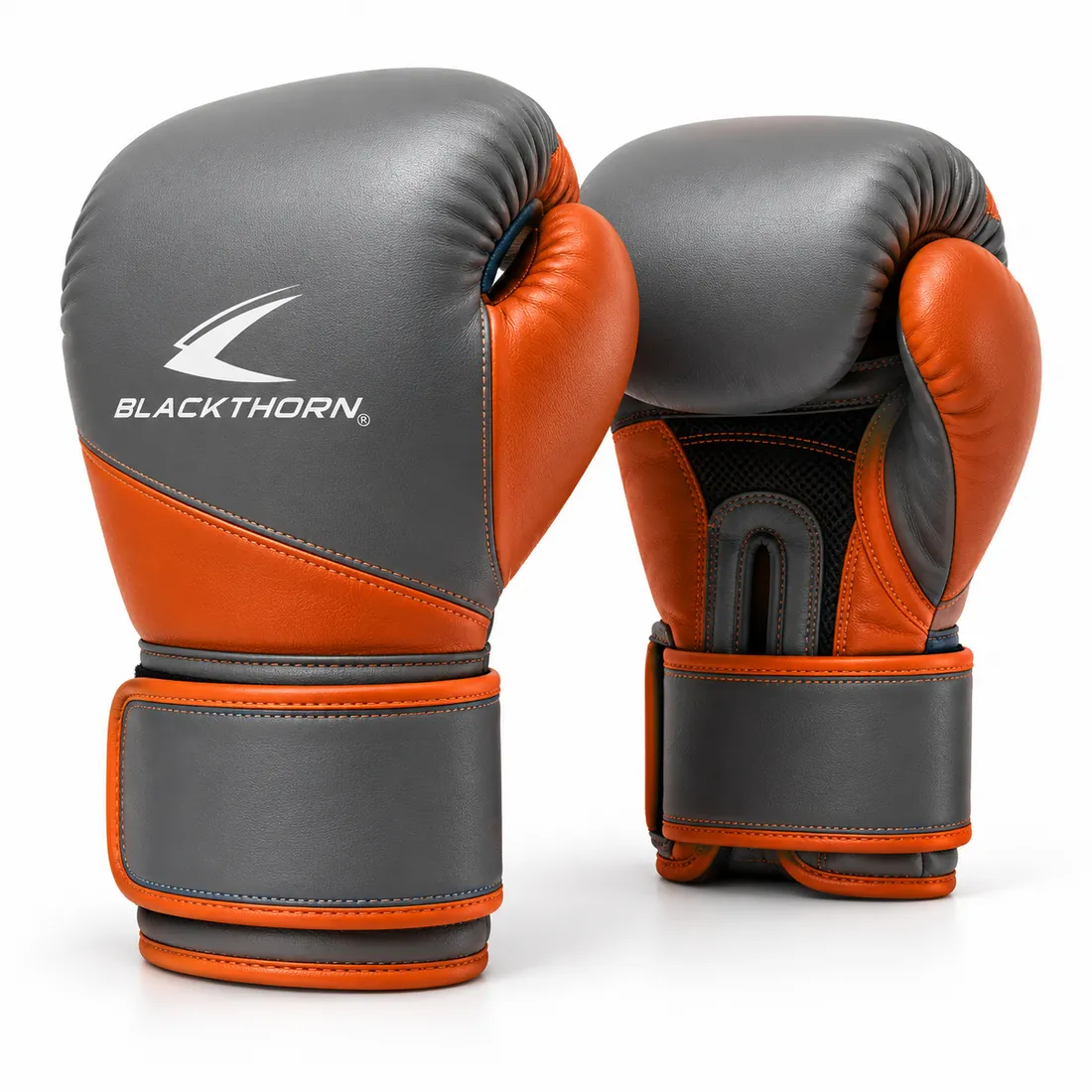 Pair of stone grey sparring gloves with orange palm side, black mesh palm and orange piping